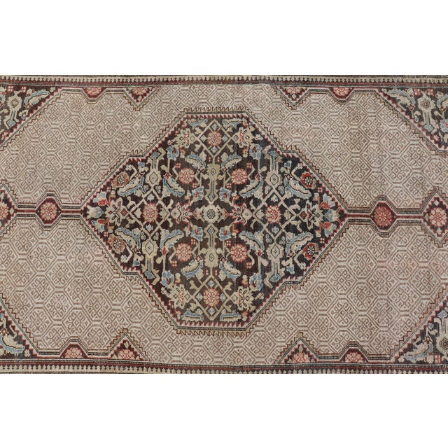 Measures: 6'7 x 10'7 Antique Persian Serab Camel Hair Rug with Medallion and Geometric Design. Keivan Woven Arts/...