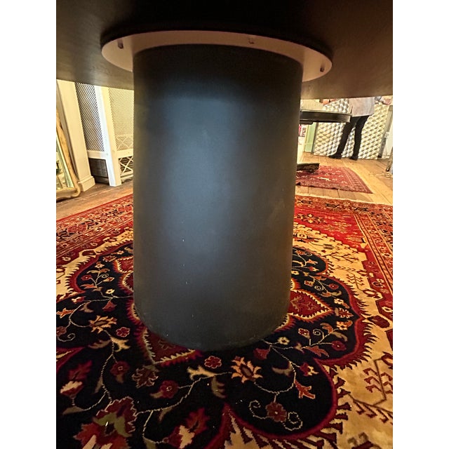 Contemporary chic ebonized solid oak round dining table with pedestal sculptural base. Top is substantial 1.5” thick. RZ...