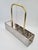 An original German bottle rack for four bottles, made of stainless steel. The item bears the original RISTOK label—Metall-...