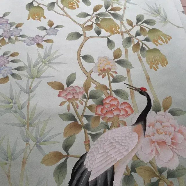 Graceful hand‑painted chinoiserie mural set with soft pale mint green background, intricately detailed with peony blooms,...