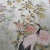 Graceful hand‑painted chinoiserie mural set with soft pale mint green background, intricately detailed with peony blooms,...