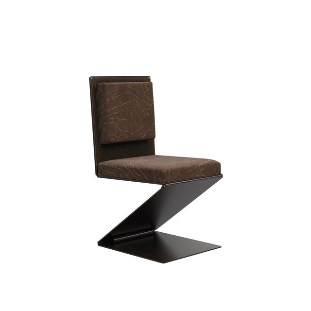 The Lombard Dining Chair captures motion in a single glance: its base, defined by sharp angles and deliberate shifts,...