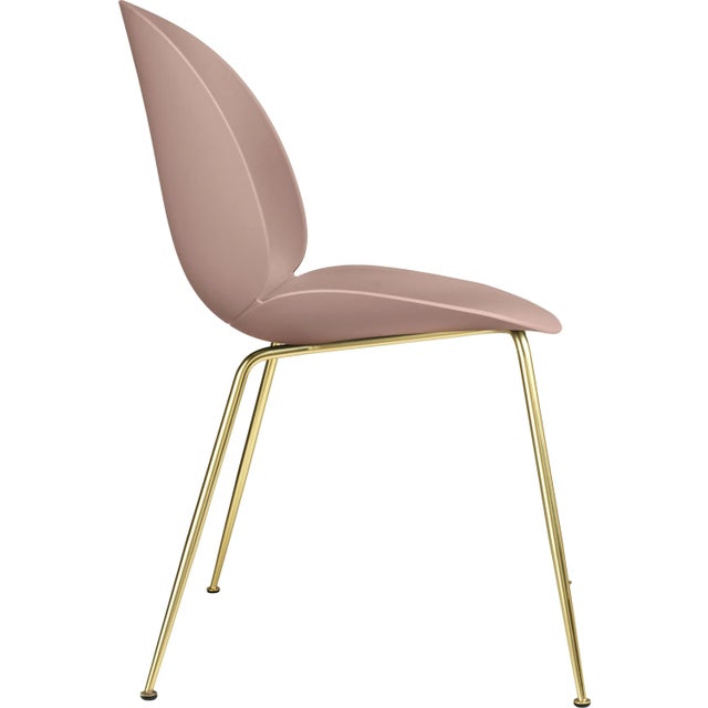 GamFratesi 'Beetle' dining chair with brass conic base. Designed by Danish-Italian design-duo GamFratesi in 2013. The...