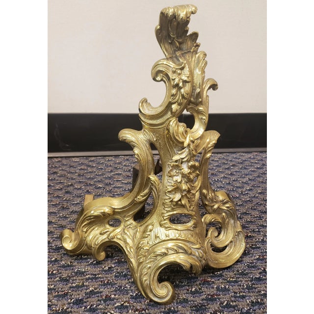 Stunning Pair of French Louis XV Style Ormolu Chenets, Each finely modeled in the form of acanthus leaf sprays.