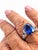 This striking Art Deco ring centers on a magnificent emerald-cut blue sapphire of 5.76 Carats NO HEAT with certificate,...