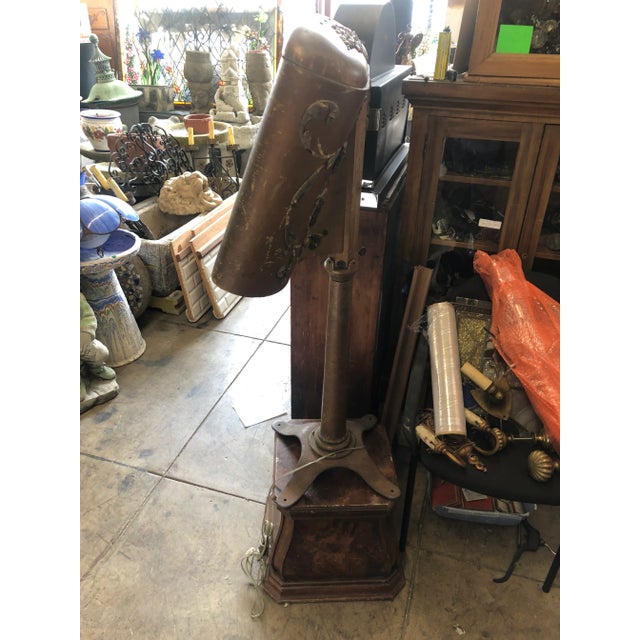 This is a illuminated conductor sheet music stand from the 19 twenties to 1930s. The specific stand came from the Williams...