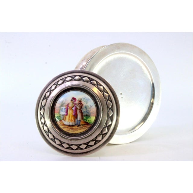 Silver Jewelry Box with Diamond-Shaped Borders and Gallant Scene in Enamel, in Very Good conditions. Designed 1890 to 1919...