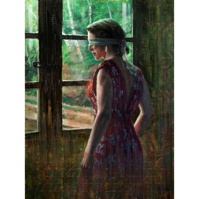 In "Feeling the Light," a figure dressed in a vibrant red dress stands near a window, her eyes covered by a blindfold,...
