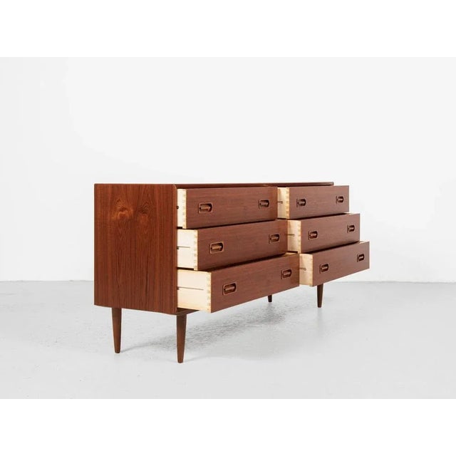 This sideboard is manufactured by Dyrlund in Denmark in the 1960s. There is a label by the manufacturer inside. The...