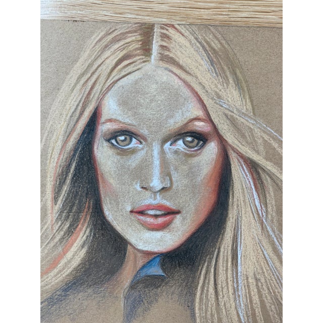These two pastel drawings depict J Crew models in a fashion/sketched manner. They are made of pastel on paper bag paper,...