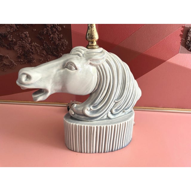 Stunning 1950s Roman horse head lamp by Phil-Mar Lamps of crackle glazed ceramic in rich shades of blue, cream, and silver...