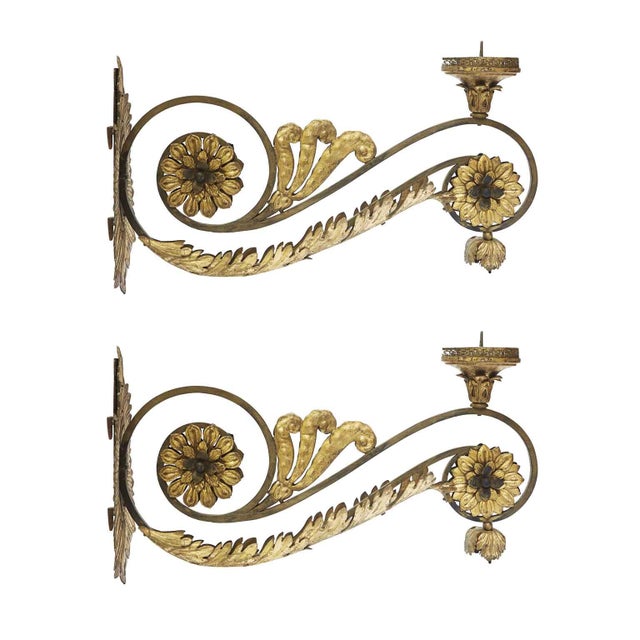 Pair of Large Gilded Sconces with Flowers and Swirls, 18th-Century Votive Lamp Arms, crafted from an imposing double-...