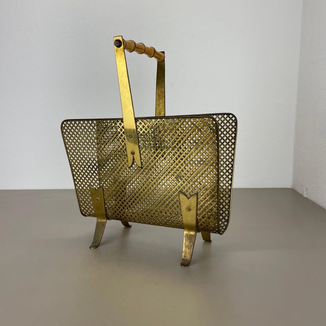 Article: magazine holder stand element Origin: Austria Age: 1950s This original vintage Auböck style magazine holder stand...