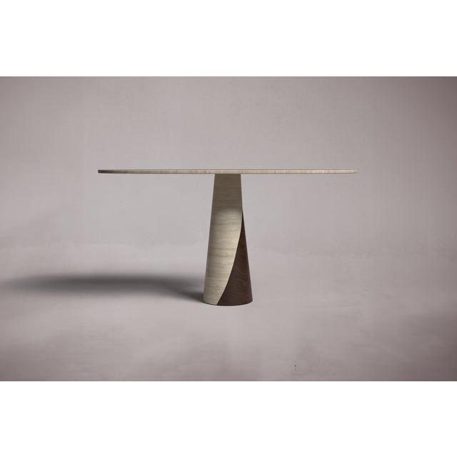 Crafted and hand-finished from solid blocks of Travertine. Travertine features natural pitting in various locations,...