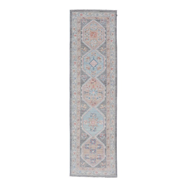 Floral Medallion Oushak Runner With Tribal Motifs and on a Gray Background For Sale