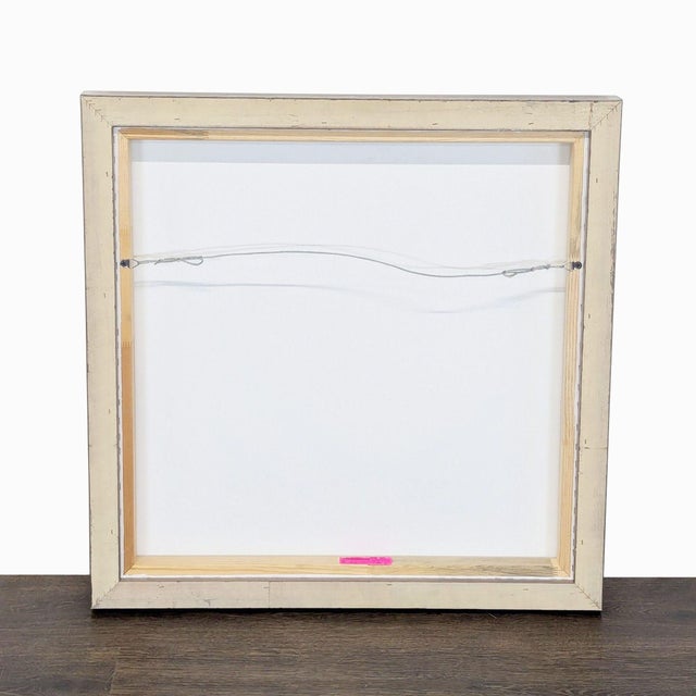 This is a modern abstract painting featuring bold black brushstrokes on a white background. The artwork is framed, giving...