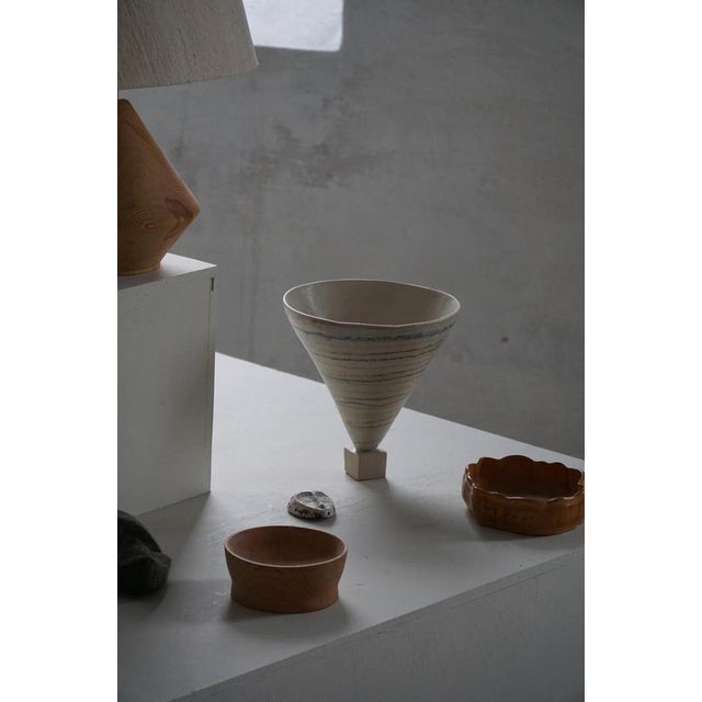 Elegant and sculptural Danish stoneware vase from the 1960s, of unknown maker. The form is striking and modernist,...