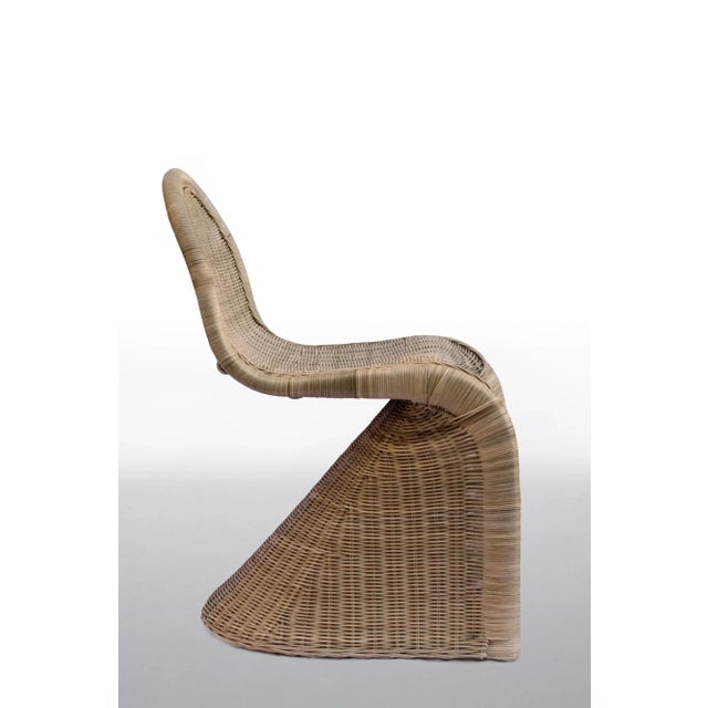 D&rsquo;apr&egrave;s Panton by Emilie Voirin is part of a collection of iconic chairs reinterpreted into rattan seats...