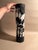 A very large cased glass cylinder with carved away black exterior, in matte and gloss black. Art nouveau in style, hand...