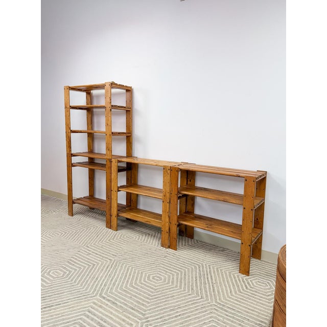 This versatile vintage modular pine shelf unit is a practical and attractive rustic storage find. Four matching shelf...