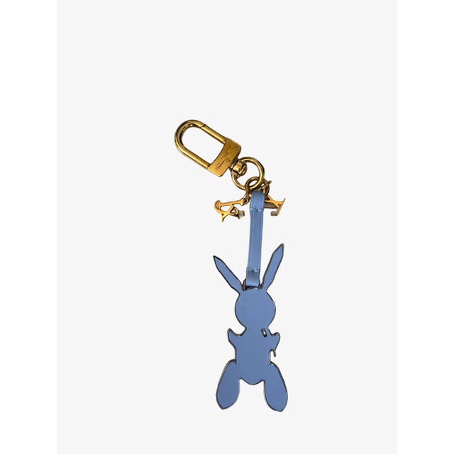 -Louis Vuitton x Jeff Koons Rabbit bag charm -Leather -Blue Color with gold tone metal hardware 1.67” width x 7.1” Height