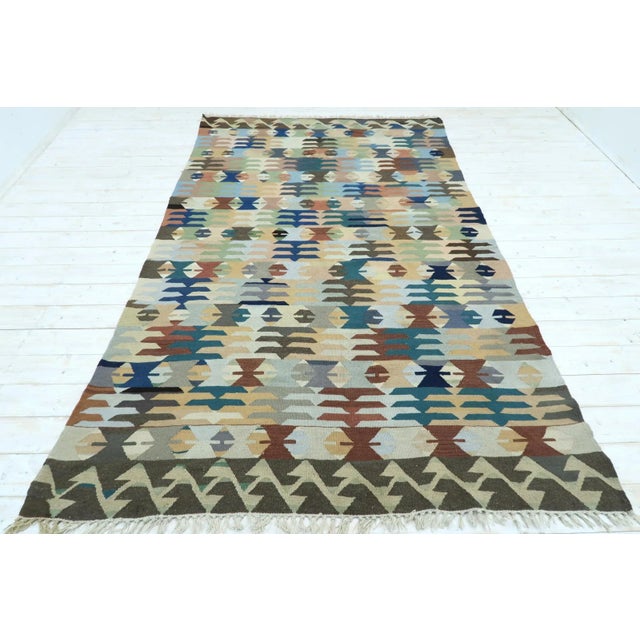 This beautiful rug from western of Turkey Denizli Nomads. Handspun Pure Wool .Kilim rug hosts an intriguing pallet of...