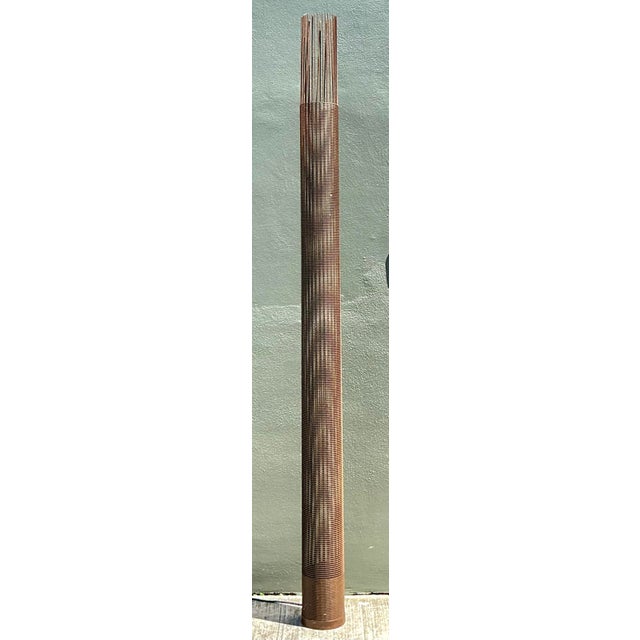 This monumental floor lamp is a striking example of Brutalist design, merging industrial materials with a high-concept...