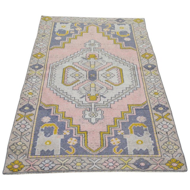 Hand-knotted with care using traditional rug-making techniques, this wool rug blends timeless craftsmanship with a modern...