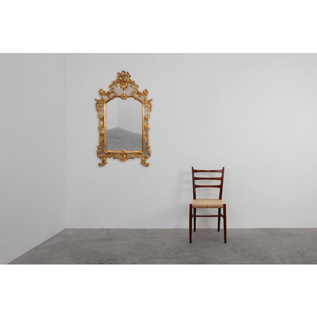 This impressive Baroque‑style mirror by Deknudt brings the grandeur of historic ornamentation into a refined 20th‑century...