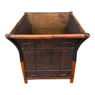 Oversized Vintage French Tortoise Rattan Planter Featuring a Curved, Flared Shape and Thick Bamboo Trim. For Sale