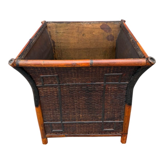 Oversized Vintage French Tortoise Rattan Planter Featuring a Curved, Flared Shape and Thick Bamboo Trim. For Sale