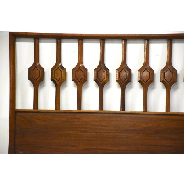 A mid century modern walnut king size headboard from the 1960’s in excellent condition. 80.5” wide. 38” tall.