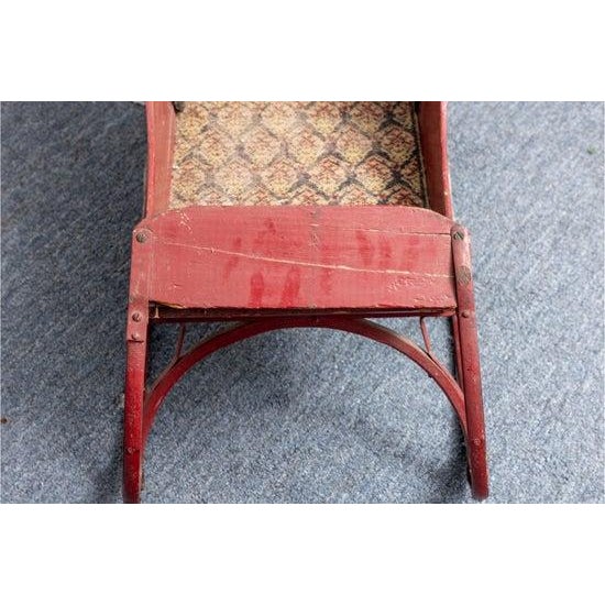 Late 19th Century Antique Children's Push Sleigh, Upholstered and Red Paint Finished Wood Frame With Metallic Rails For Sale - Image 5 of 6