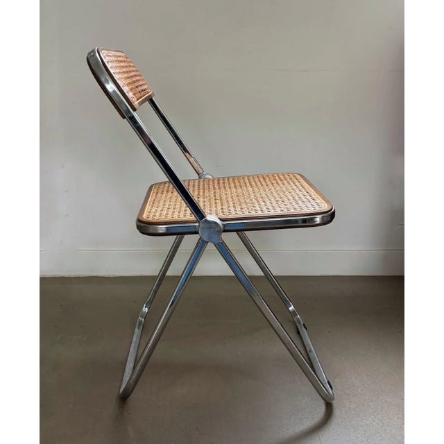 Folding chair ‘plia’, with a webbing seat and backrest, designed by giancarlo piretti for castelli in 1967. beautiful,...