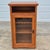 This is a mission or arts & crafts style oak veneer cabinet with a leaded glass door by Aspen Furniture. It is originally...
