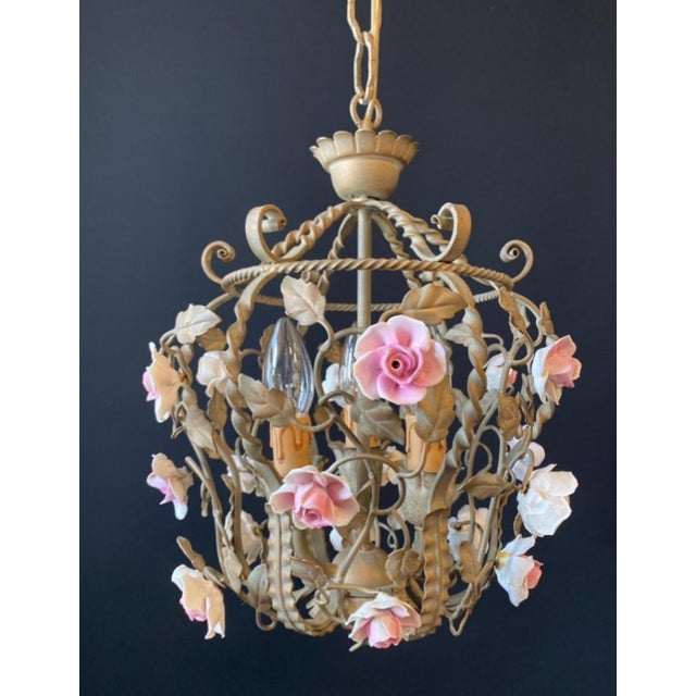 The chandelier is crafted in the florentine style. Material: coated iron—exquisite artistic wrought ironwork. Decorated...