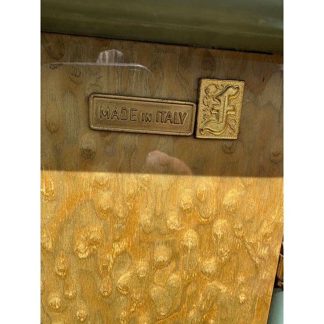 A sturdy, custom-made, dining set and ship from Italy. It is made of auto world and Burwood with an inlay of Ebony and...
