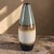 This Mid-Century-Modern Glazed Pottery Multi Colored Tube Vase is a stylish and unique piece of decorative pottery. Made...