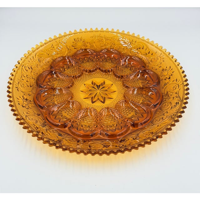 Timeless elegance of this stunning vintage Indiana Glass Tiara Amber Deviled Egg Serving platter! This exquisite piece...