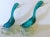Lovely pair of Murano Italian glass ducks appear to be skimming the water together. Both have bubbles throughout their...