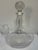 A refined mid-century European crystal brandy service comprising a sculptural decanter with matching snifters, each...