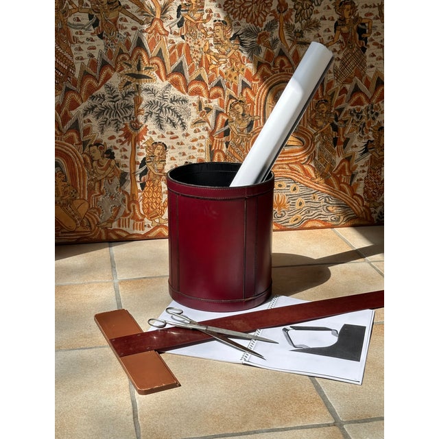 This high quality leather waste basket or storage bin for paper poster rolls was hand-crafted in France during the 1970s....