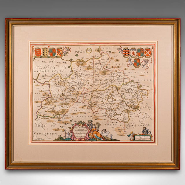 This is an antique county map of Buckinghamshire and Bedfordshire. A Dutch, framed atlas engraving by Johannes Janssonius,...