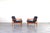 This set of two armchairs was designed in the 1960s by Erik Wørts and manufactured by IKEA in Poland. The frame of the...