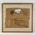A salvaged corrugated shipping box portion that includes all the shipping info from a parcel shipped by the artist Chaim...
