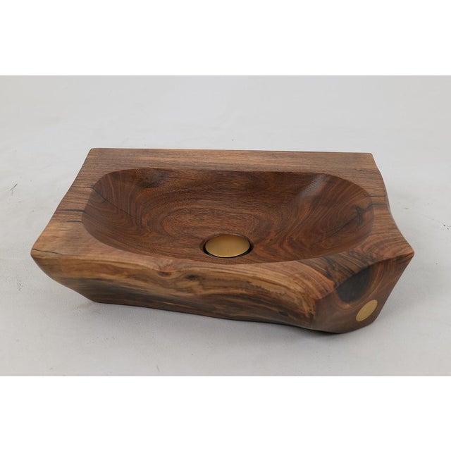 Handmade carved walnut sink, a stunning blend of natural beauty and artisanal craftsmanship. This unique piece features a...