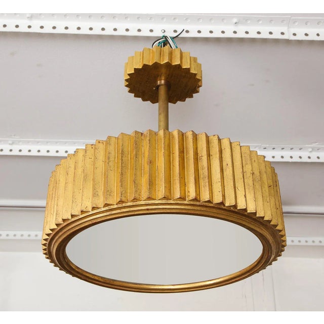 Bespoke Giltwood hand-carved fixture in the Art Deco manner.