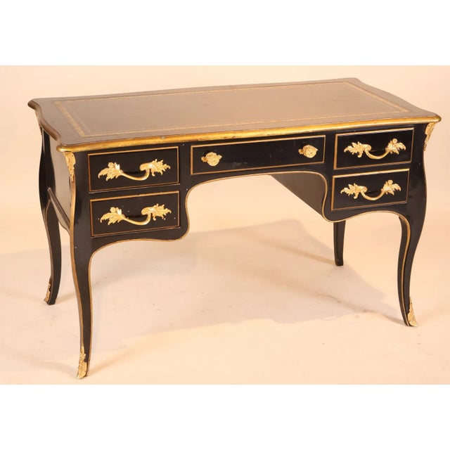 This ebonized bureau was manufactured by Bodart, known for producing furniture inspired by historical styles. Stamped...