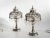 Vintage pair of silver plated brass bedside table lamps with clear-cut crystal droppers. Spain, circa1950s. Each lamp has...