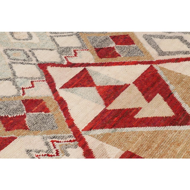 Hand-knotted in silk, this 5x7 contemporary Moroccan style rug features a ribbed texture and geometric patterns inspired...